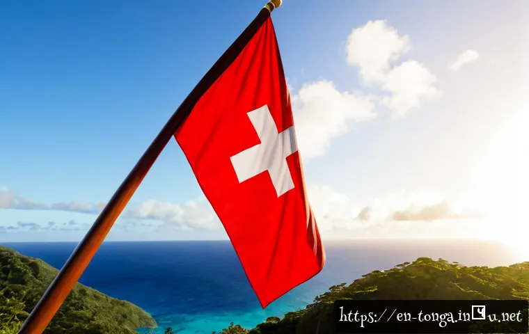 Home 17 통가 국기 및 의미 - Photorealistic Tonga national flag billowing clearly on a polished wooden flagpole against a bright ...